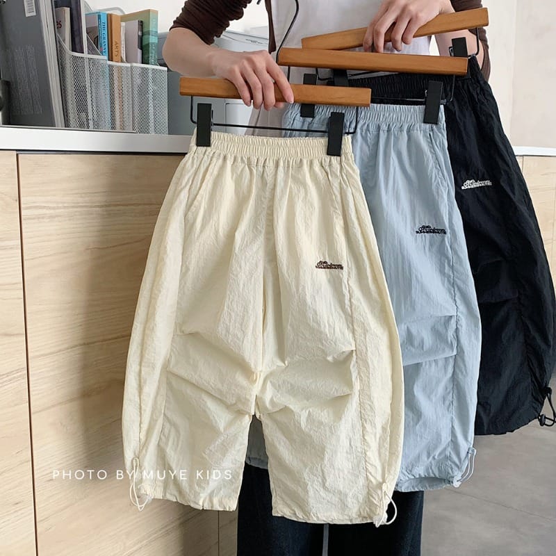 【KID】裾ドロストワンポイントロゴナイロンロングパンツ