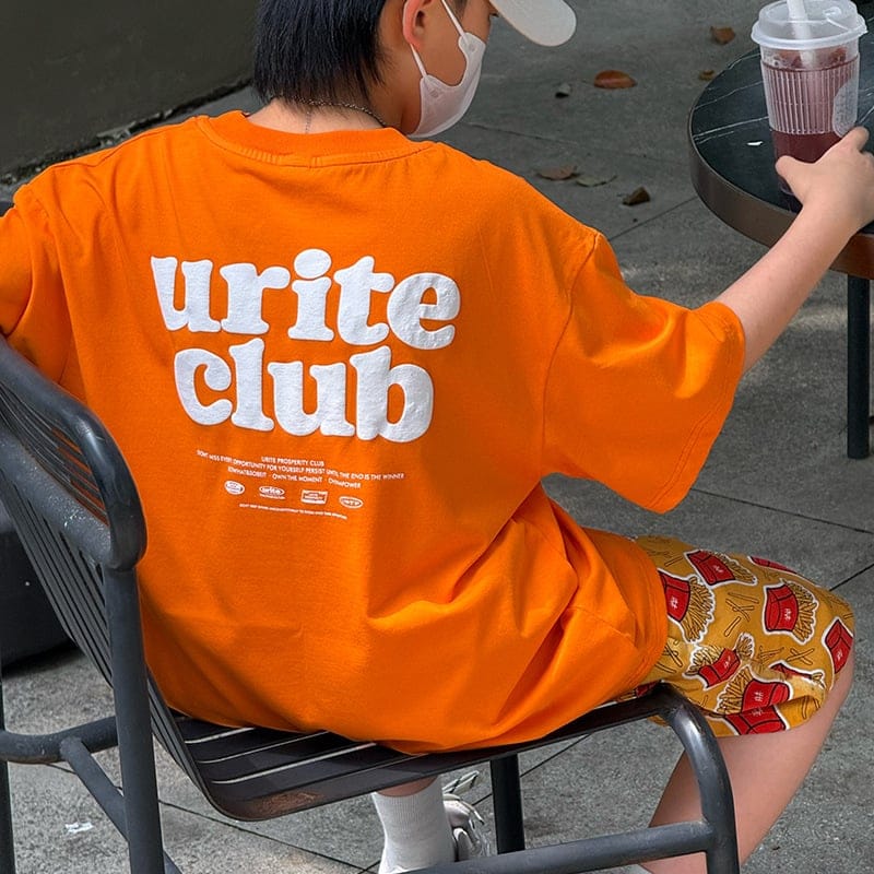 バックロゴプリントオレンジ半袖Tシャツ