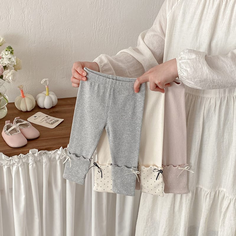 ドット柄レイヤード風裾リボンレギンス