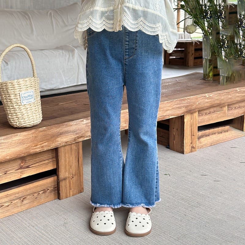 裾フリンジデザインフレアデニムパンツ