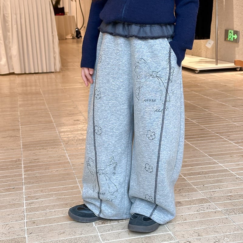 リボン総柄プリントペンシルスウェットパンツ