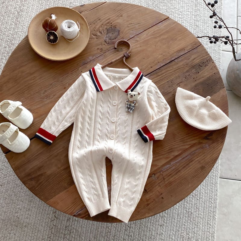 【BABY】プレッピー配色ケーブルニットロンパース